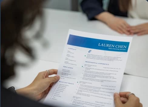 Recruiter reviewing a resume